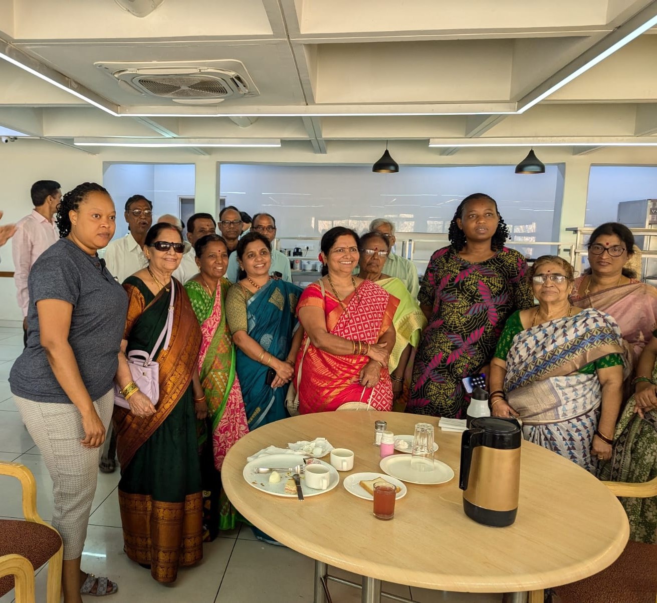 Women members after Breakfast with a foreigner in the canteen.jpeg